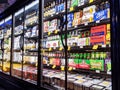 View of beer fridge inside Uwajimaya Asian Grocery store, filled with imported alcohol and local brews