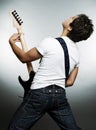 View from behind on the man with guitar Royalty Free Stock Photo