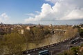 View from behind the tree branches of Rome and the Vatican against the blue sky Royalty Free Stock Photo