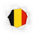 Belgium flag through the paper Royalty Free Stock Photo