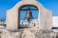A view of a bell on the battlements of the Castle of San Cristobal, San Juan, Puerto Rico