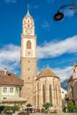 View at the Bell tower of Church of Saint Nicholas in the streets of Merano - Italy Royalty Free Stock Photo