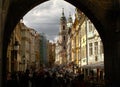 View of the bell tower of the church of St. Nicholas from the arch of the Charles Bridge in Prague