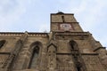 View of the bell tower of the historic gothic Black Church in the city of Brasov. Transylvania. Romania Royalty Free Stock Photo