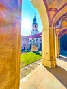 The view on bell tower of Loreta of Prague through the arcades of its cloister, Czechia Royalty Free Stock Photo