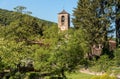 View of the bell tower of the Parish Museum of the Abbey of Saint Gemolo in Ganna, Valganna, Italy