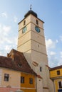 View of the bell tower of the Roman Catholic Church of the Holy Trinity in the city of Sibiu. Transylvania. Romania