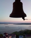 Bell on the background of the setting sunset Royalty Free Stock Photo