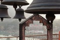 View of bells in hinduist temple Shri Makar Vahani Ganga Jee and Sita Ram Dham Ashram on the riverbank of Ganga in Rishikesh