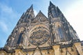 View from below on the St. Vitus Cathedral with a round ornament in Prague Royalty Free Stock Photo