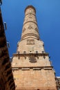 View from below to the top on ornate minaret of the Mardin Grand Mosque in Turkey Royalty Free Stock Photo
