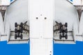 View from below under the flying airplane before landing, in detail chassis, wings, flaps, fuselage and engine. Royalty Free Stock Photo