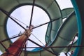 View from below a water slide looking up through the structure Royalty Free Stock Photo