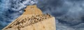 View from below of the western profile with limestone sculptures and Henry the Navigator on the bow of the Monument to the