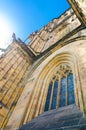 View from below of window of South Tower - exterior of St. Vitus Cathedral in Prague Castle Royalty Free Stock Photo