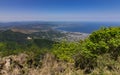 View on Beppu City and Bay between Mountains of Kyushu and green Landscape in the foreground from Mount Tsurumi. Beppu, Oita
