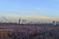 View of a big city from a city park in late autumn on a clear day Royalty Free Stock Photo