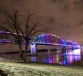 View on Big Four Bridge and Ohio river in Louisville at night with colorful illumination in spring Royalty Free Stock Photo
