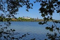 View of the big lake Ploen, the Ploen castle and the St. Nicholas church in Ploen, Schleswig-Holstein, Germany Royalty Free Stock Photo