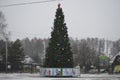 The beautiful view of the New Year tree on the square near the kinder park.