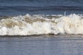 View on big struggled waves at the northern sea at juist