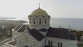 View of the big white church with golden domes in front of beautiful river, spring Vologda, Russia. Shot. Beautiful Royalty Free Stock Photo