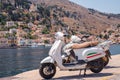 View of the bike on a coast of Symi island in summer day, Greece, Europe