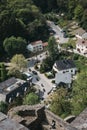 View of bikers riding through Vianden from Vianden Castle, Luxembourg Royalty Free Stock Photo