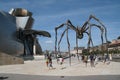 View of Bilbao Guggenheim Museum and the spider sculpture `Maman` by artist Bourgeois.
