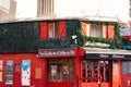 View of Bistrot restaurant's red exterior in Paris, France