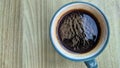 View of Black coffee and wooden table Royalty Free Stock Photo