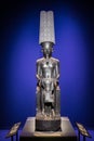 Amun god sculture protecton Tutankhamun children