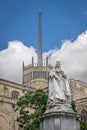 A view of Blackburn cathedral with statue of Queen Victoria Royalty Free Stock Photo