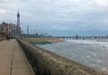 View of blackpool promenade in winter with stormy sea tower and central pier Royalty Free Stock Photo