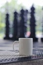 A blank white coffee mug on the chess game Royalty Free Stock Photo