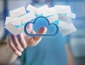 Blue cloud surrounded by realistic envelope email displayed on a