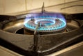 View of blue flames on gas stove burner Royalty Free Stock Photo