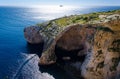 Blue grotto arch on Malta island and Filfla, Mediterranean sea Royalty Free Stock Photo