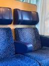 View of the blue passenger seats in the train interior Royalty Free Stock Photo