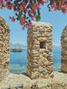 view of blue sea and ship through old walls of fortress. concept of a beach holiday and sea tours. Alanya Turkey. soft Royalty Free Stock Photo