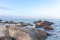 View of blue sea waves at rocky beach. Horizon line. Caspian Sea, sandstone coast. ustyurt. Selective focus, long shutter speed