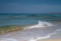 View of blue sea waves at sandy beach. Horizon line. Caspian Sea, sandstone coast. ustyurt. Selective focus, long shutter speed