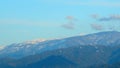 View Blue Sky Over Mountain. Sunset In A Mountain Range With Clouds Backlit. Royalty Free Stock Photo