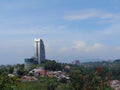 view of blue sky and white clouds over apartments and residential areas