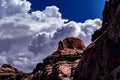 View of blue sky and white clouds over the red rocks of Lake Powell Royalty Free Stock Photo