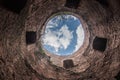 View of blue sky with white clouds through tower of Akkerman