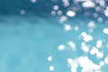 View of blurry surface of turquoise water with glare in swimming pool, sea, lake, or ocean, summer mood background. Concept rest, Royalty Free Stock Photo