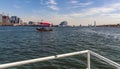 A view from a boat as Abra, water taxis ply their trade on the Dubai Creek in the UAE Royalty Free Stock Photo