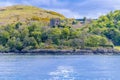 A view from a boat on the Firth of Lorn towards Dunollie Castle at Oban, Scotland