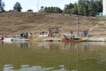 view from the boat of Indian tourists by the coast of Sanasar lake Royalty Free Stock Photo